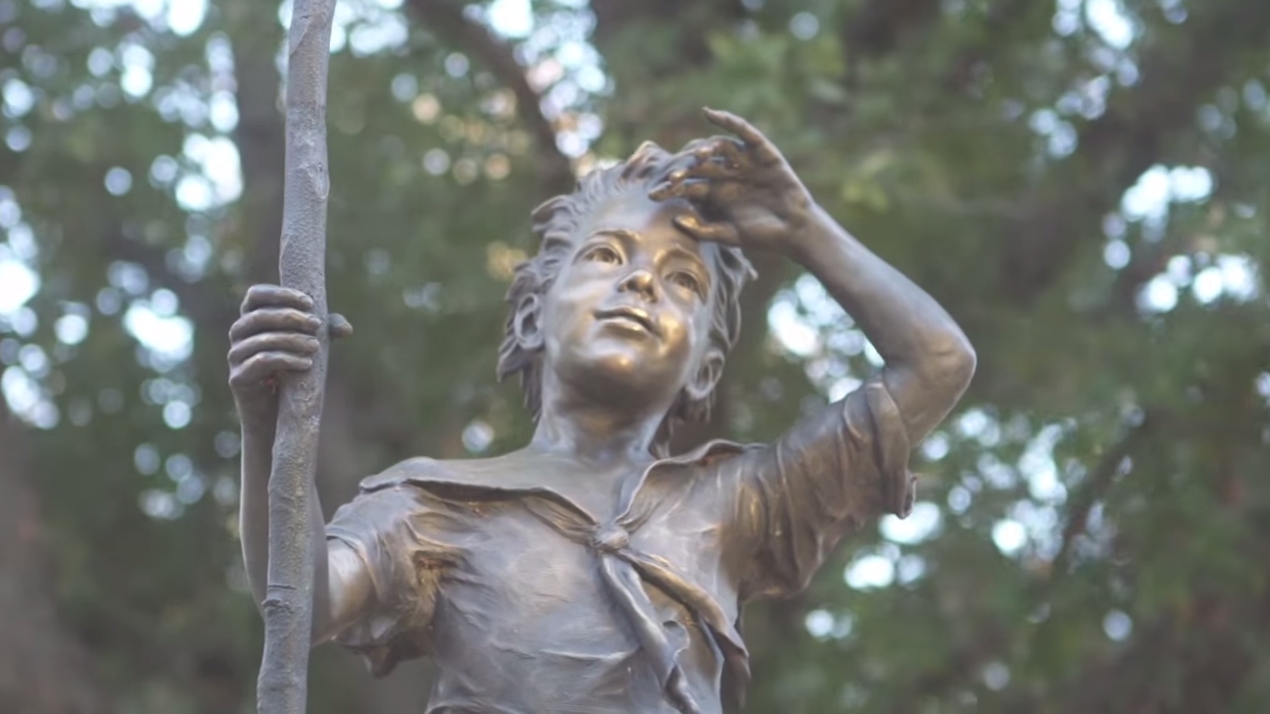 Beautiful still of the Lena Pope child statue at headquarters from the professional Lena Pope video series by Red Productions